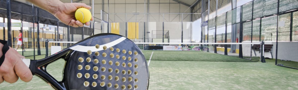 Player Serving in Padel Tennis Player Serving in Padel Tennis