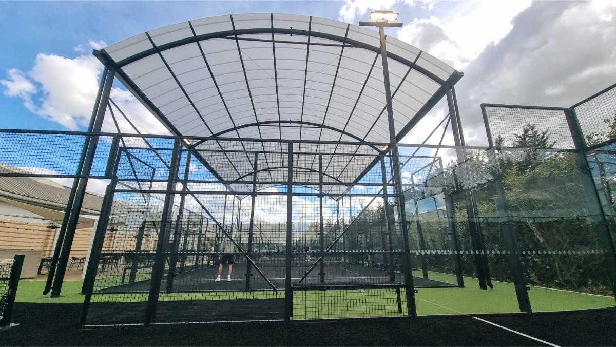 A covered padel court canopy